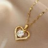 Golden Heart Pendant Necklace with Zircon Accent