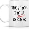 Trust Me I'm Almost a Doctor Funny Coffee Mug, Medical Student Gift for Medics Nurses Doctors, Graduation Birthday Gift for Friends Coworkers Trust Me I'm Almost a Doctor Funny Coffee Mug, Medical Student Gift for Medics Nurses Doctors, Graduation Birthday Gift for Friends Coworkers